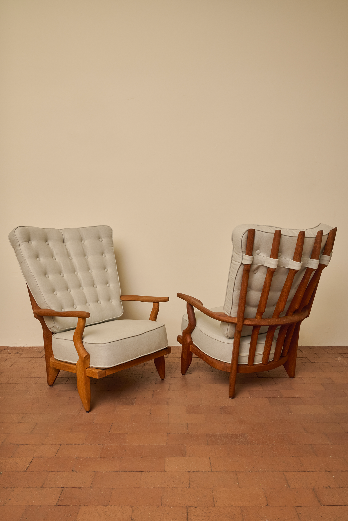 GUILLERME ET CHAMBRON GRAND REPOSE ARMCHAIRS